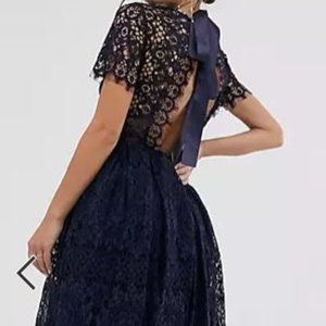 ASOS DESIGN lace midi dress with ribbon tie and open back